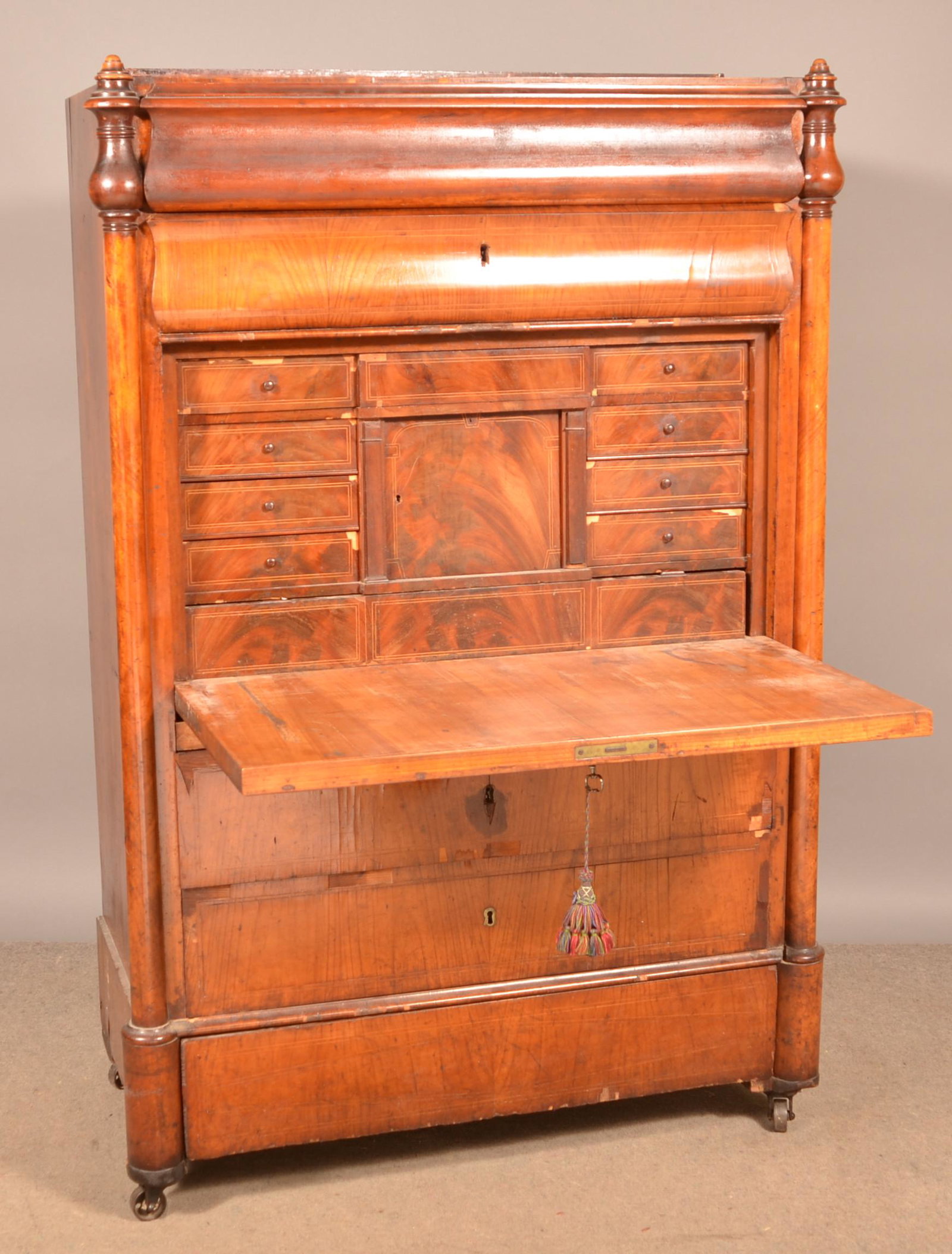 Biedermeier Period Drop-Front Butlers Desk.: Biedermeier Period Drop-Front Butlers Desk. Fruitwood veneer with fitted interior. 62"h. x 41"w. x 22"d. Condition: Fair with wear and losses, "as is".
