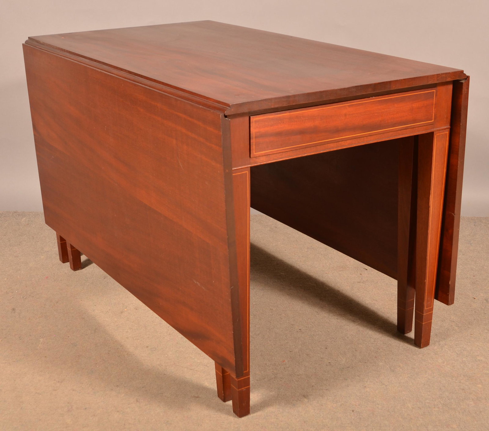 Hepplewhite Line Inlaid Mahogany Drop Leaf Table.: American Hepplewhite Line Inlaid Mahogany Drop Leaf Table. Six leg, gate leg. 30-1/4"h. x 48"w. x 27-3/4"d. each leaf measures 24-1/4". Condition: Good with minor wear.