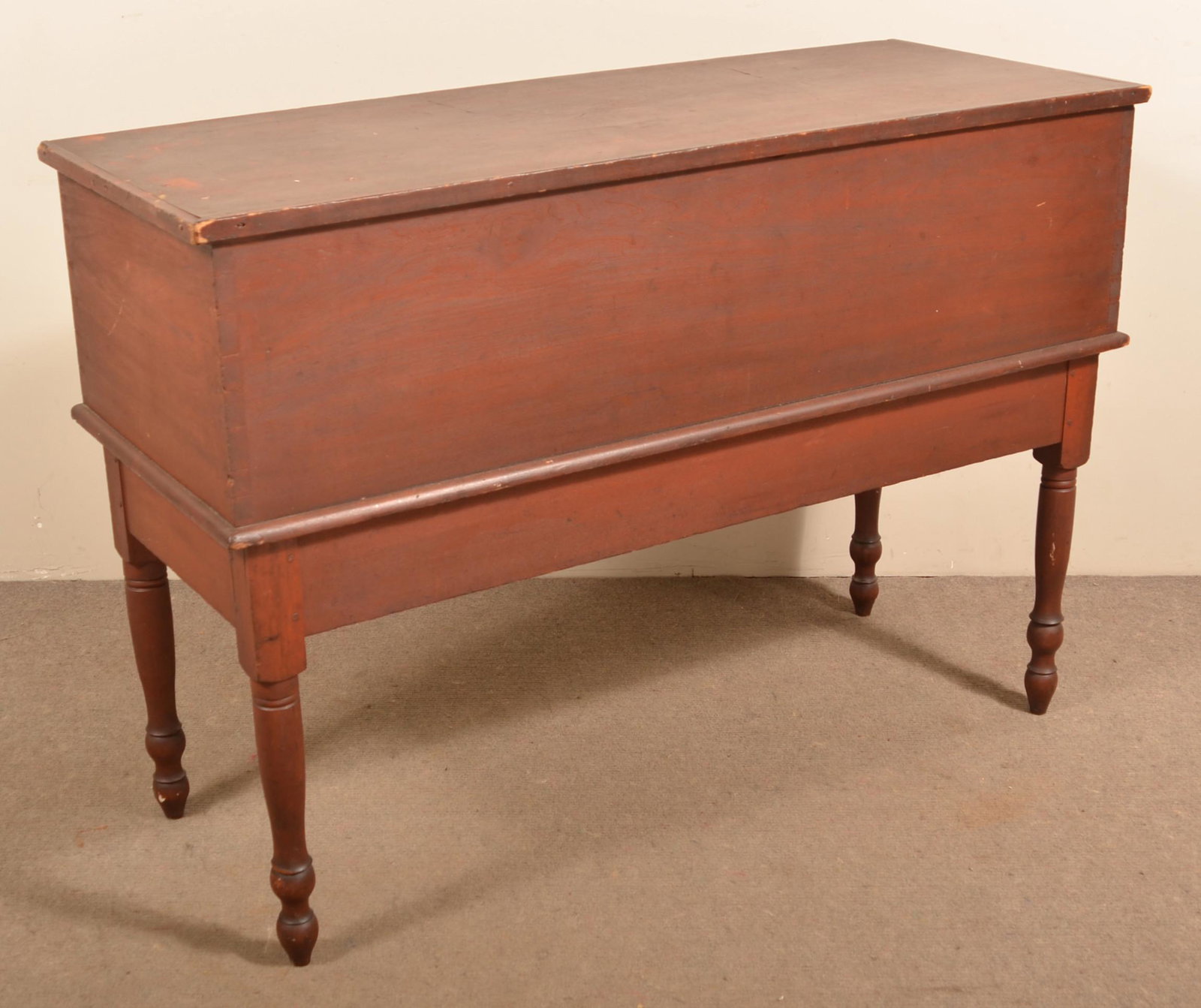 American Sheraton Softwood Sugar Chest.: American Sheraton Softwood Sugar Chest. Original red paint, dovetailed case and turned legs. 35"h. x 50"w. x 20"d. Condition: Good with minor wear, wood repair around middle hinge.