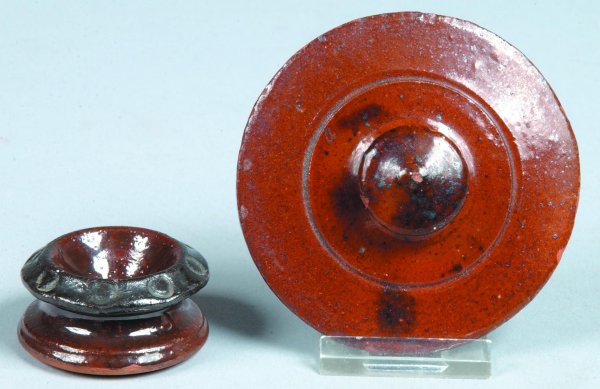 Stahl Pottery Redware Salt and Jar Lid, round with: Stahl Pottery Redware Salt and Jar Lid, round with concave sides, stamped circle banding, brown mottled glaze, inscribed "made by RR Stahl 8/8/47", lid with finial, (minor glaze chip to salt).