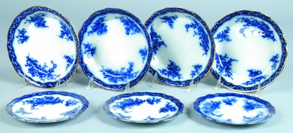 Seven Flow Blue "Touraine" Pieces, Three Plates 6-: Seven Flow Blue "Touraine" Pieces, Three Plates 6-5/8"diam., Four Bowls, 7- 5/8"diam., printed maker marks, (good condition with one plate with chip repair).