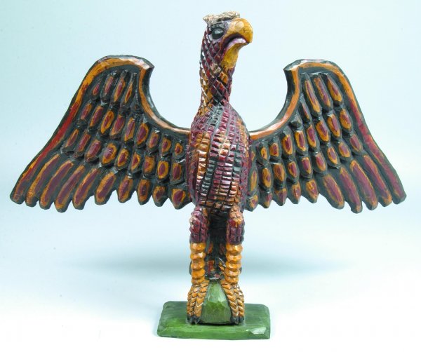 Good Hand Carved Wilhelm Schimmel Stylized Eagle b: Good Hand Carved Wilhelm Schimmel Stylized Eagle by David Ludwig, carved pine, polychrome painted, cross hatched body, signed on bottom "d. m. Ludwig, York", 18-¾"h. x 29"wingspan, (good, split to ba
