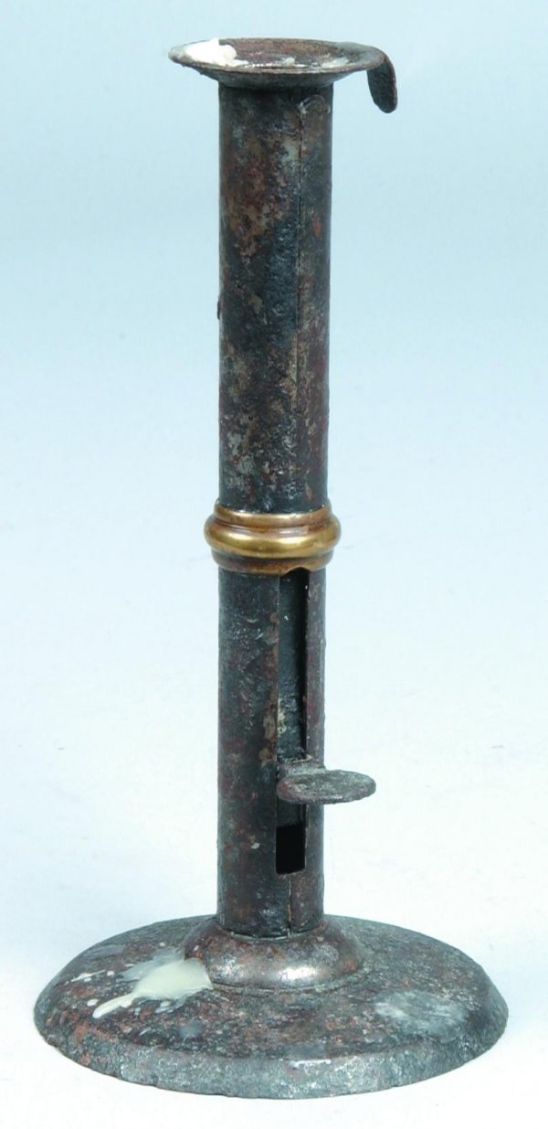 Tin Hog Scrapper Push-up Candle Stick, round drip : Tin Hog Scrapper Push-up Candle Stick, round drip tray with finger tab on round shaft with brass "wedding" band, adjustable push-up finger pad, round base, 8"h. x 4"dia., (oxidation).
