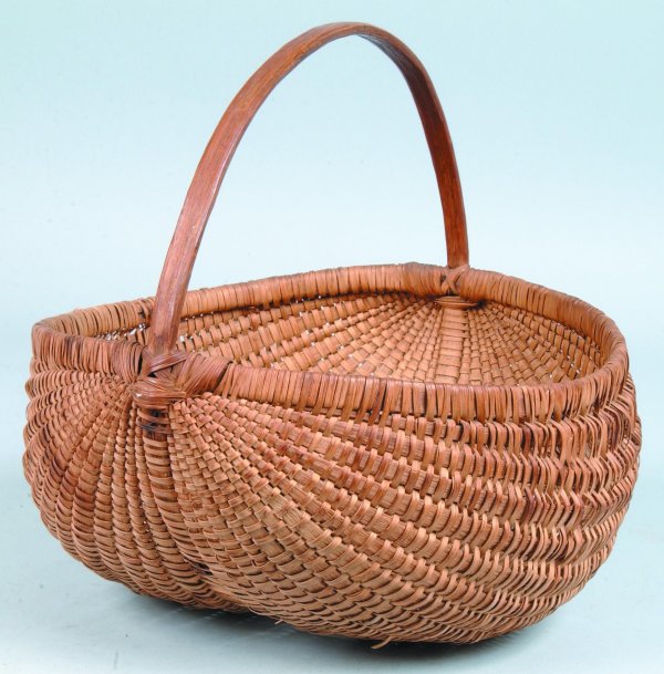 Large Splint Oak Field Basket, round form with dom: Large Splint Oak Field Basket, round form with dome bottom, carved and bent wood handle and rim, 14"h. x 16"dia., (losses to rim and bottom).