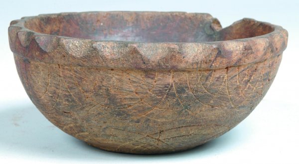 Carved Wood Bowl, round hardwood form with gouge s: Carved Wood Bowl, round hardwood form with gouge serrated rim, decorated with compass arch banding and star on bottom, natural finish, 3-1/2"h. x 8"dia., (rim loss).