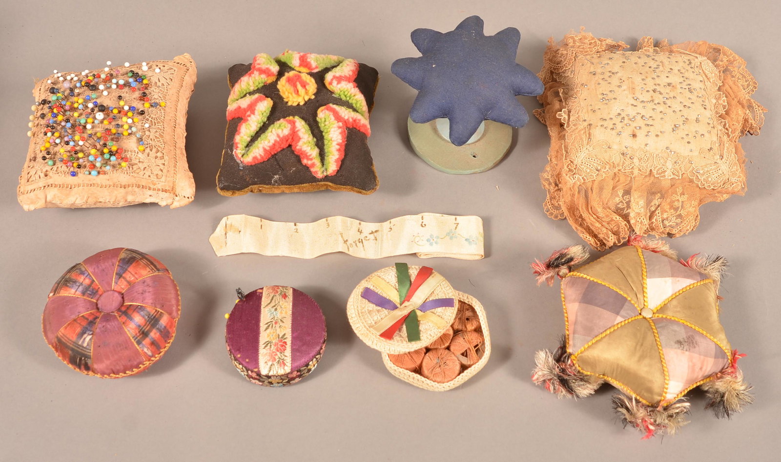 Lot of Antique Pin Cushions and Sewing Items.: Lot of Antique Pin Cushions and Sewing Items. Condition: Fair to good.