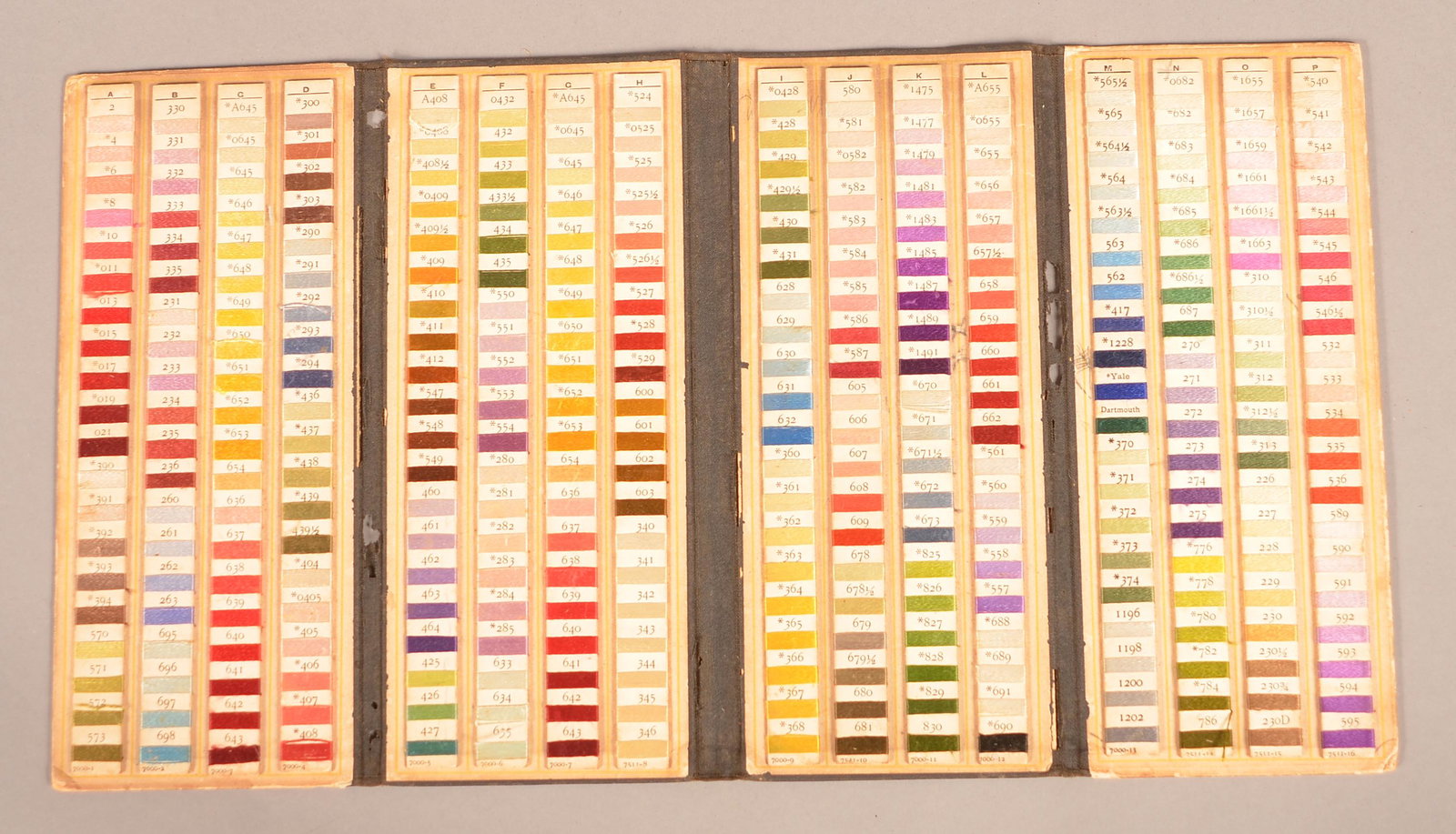 Hemmingway & Sons Art Needlework Silk Sample Book.: M. Hemmingway & Sons Art Needlework Silk Sample Book. With numbered samples and color identification chart. Four section fold-out booklet. 8-1/2" x 3-58". Condition: Good with wear and toning.