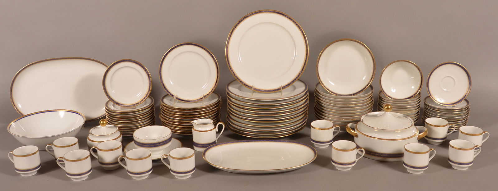 Schumann Artzberg 79 Piece China Dinnerware Set.: Vintage Schumann Artzberg 79 Piece China Dinnerware Set. Bavarian Cobalt blue and gold trimmed set. Consisting of twelve 6 piece place settings: 10-1/2" dinner plates, salad plates, soup bowls, desser
