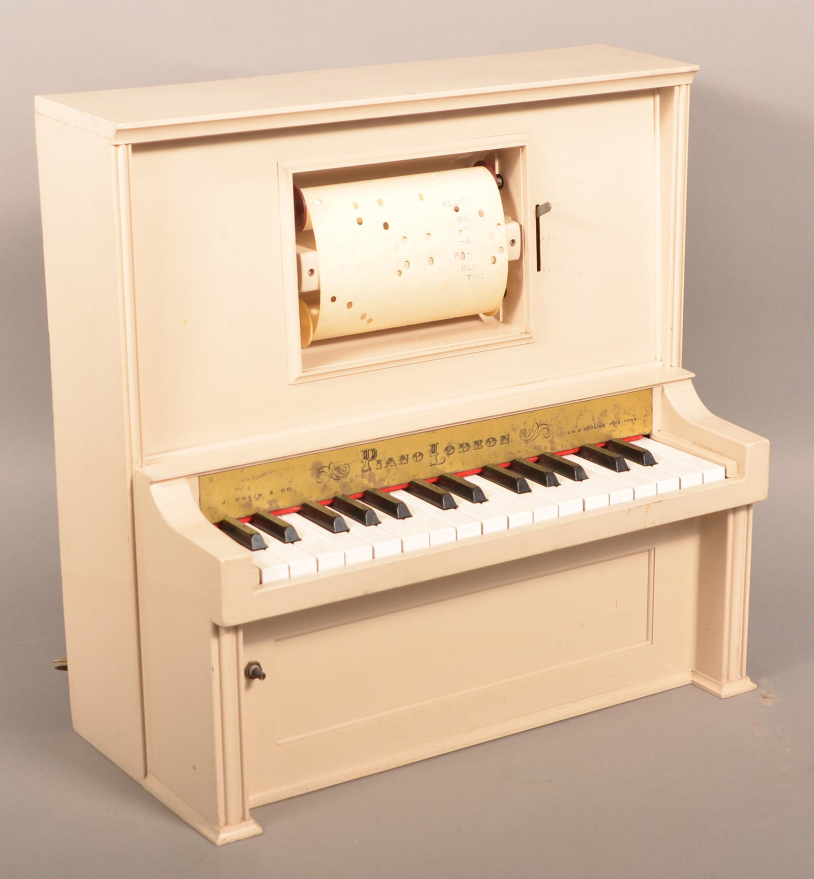 J. Chein Piano Lodeon Toy Player Piano.: J. Chein Piano Lodeon Toy Player Piano. 20"h. x 19-1/2"w. x 10"d. Condition: Very good with use wear.