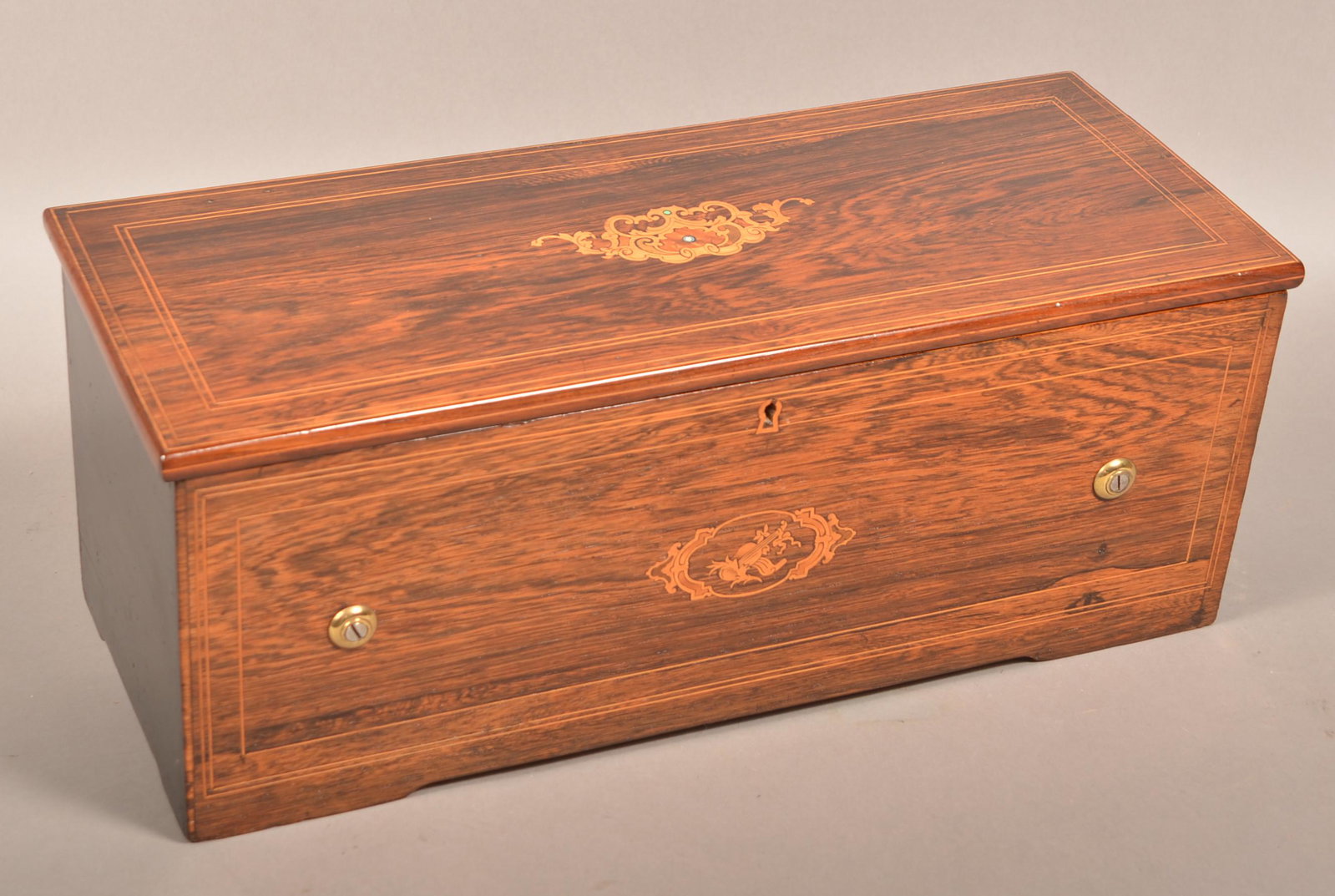Fabrique De Geneve Swiss 8 Tune Cylinder Music Box.: Fabrique De Geneve Swiss Eight Tune Cylinder Music Box with Drum and Bells. 19th century, Inlaid rosewood case. 8-1/2"h. x 22-1/2"w. x 8-3/4"d. Condition: Very good.