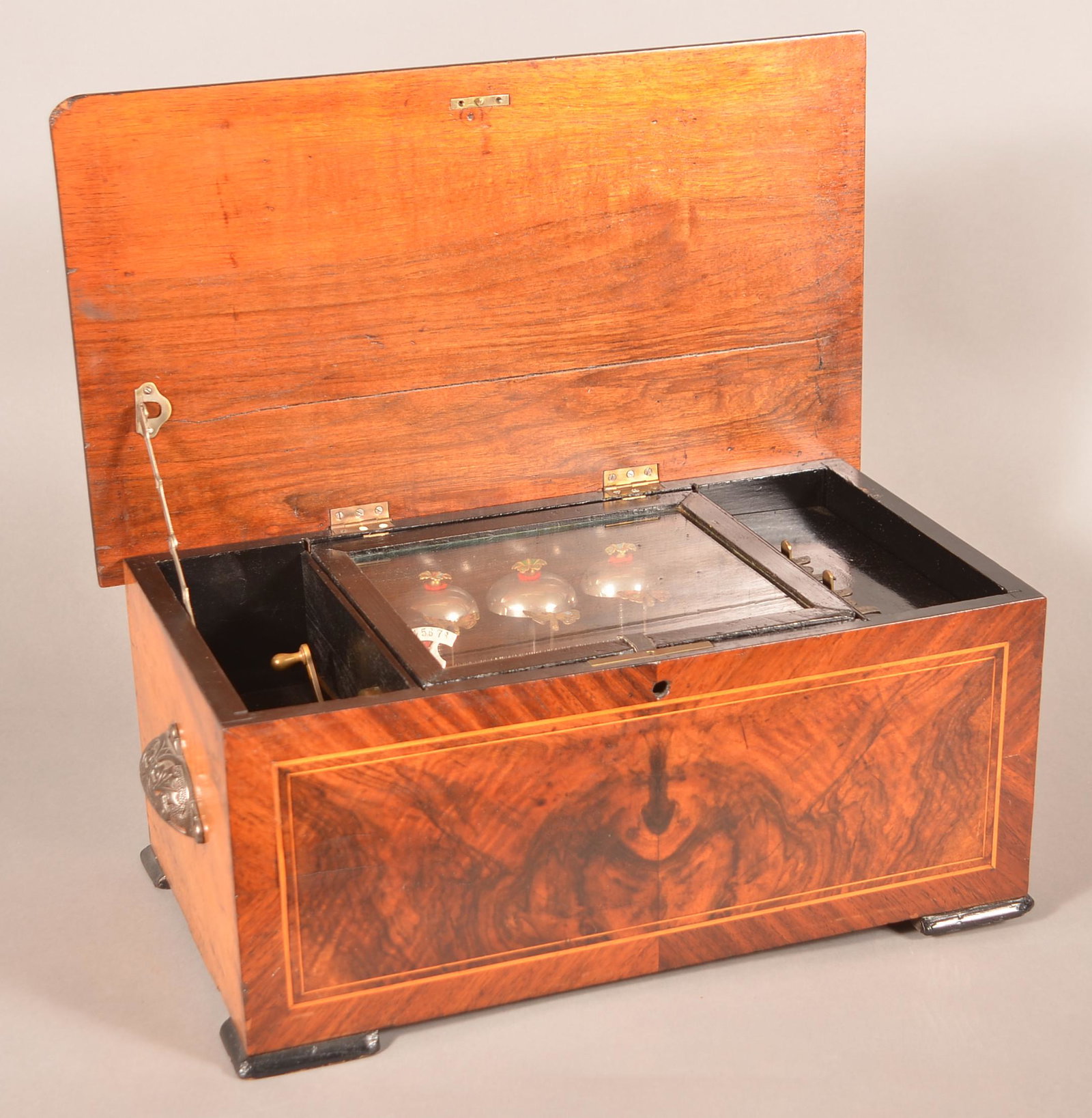 Swiss 8 Tune Cylinder Music Box with Butterflies &: Antique Swiss 8 Tune Cylinder Music Box with Enameled Butterflies & Bells. Line inlaid burl mahogany case. 8-1/2"h. x 19"w. x 11"d. Condition: Very good with minor wear, age crack on lid.