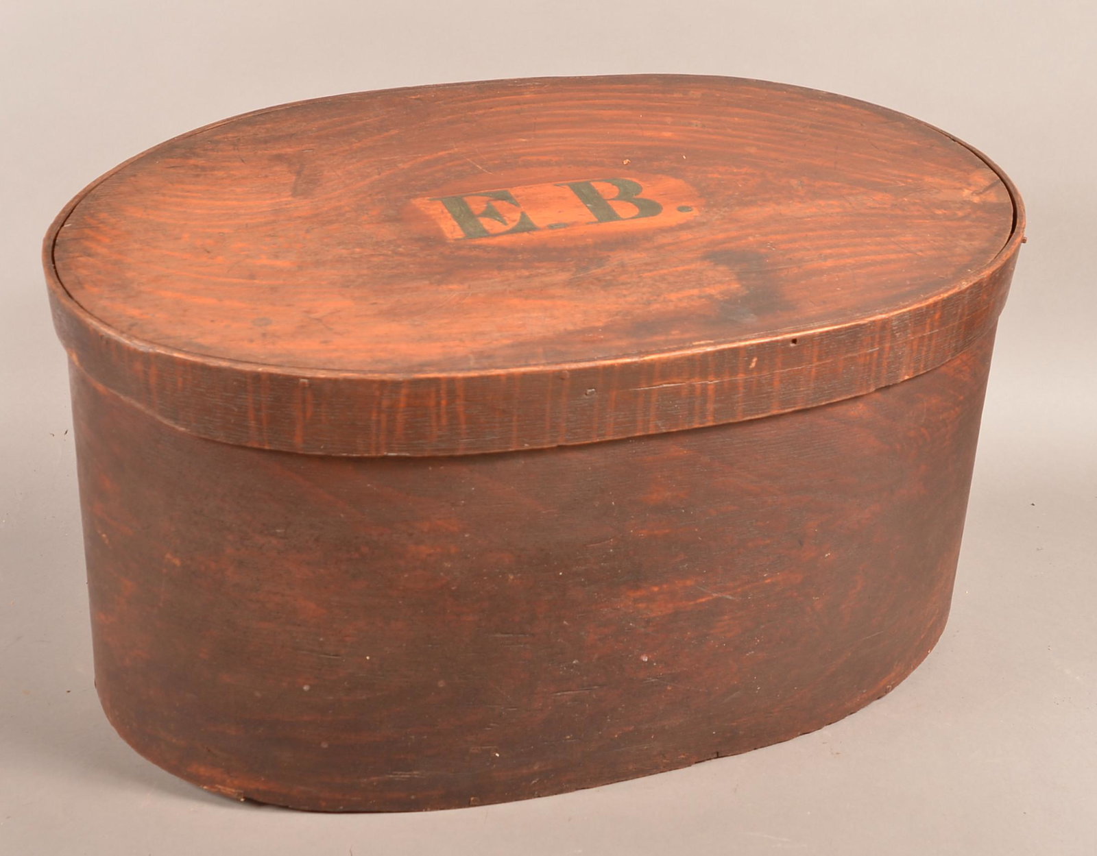 Large American 19th Century Painted Bentwood Box.: Large American 19th Century Painted Bentwood Storage Box. Oak and pine with original salmon ground grain paint. Lid is initialed "E.B.". 13-1/2"h. x 28"w. x 18"d. Condition: Good with wear and minor l