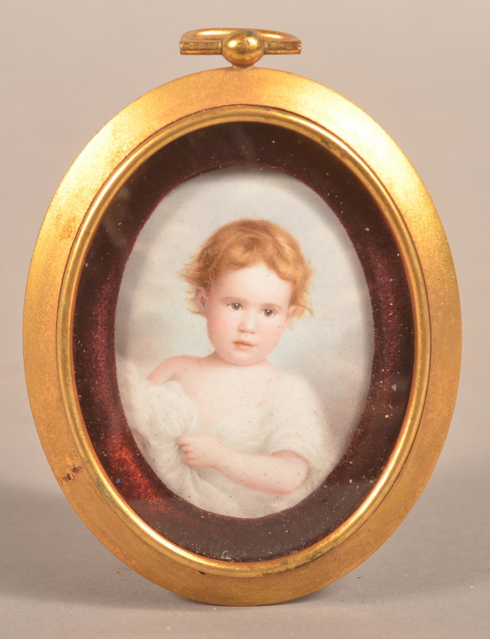Mathieu Deroche French Enamel Miniature Portrait.: Mathieu Deroche French Enamel Miniature Portrait Dated 1900. Signed on front and verso. Half torso oval portrait of a Toddler. Image 2-3/4" x 2-1/4", in a gilt metal oval frame. Condition: Very good.