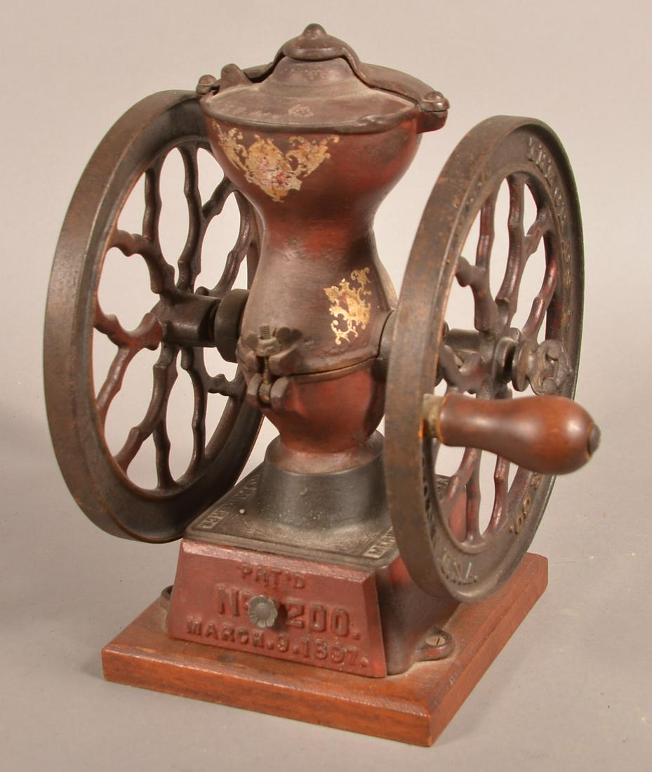 Chas. Parker No. 200 Cast Iron Coffee Grinder.: Chas. Parker No. 200 Cast Iron Coffee Grinder. Pat. March 9, 1897. Original paint and decals. 13"h. Condition: Good with light scattered rust and use wear.