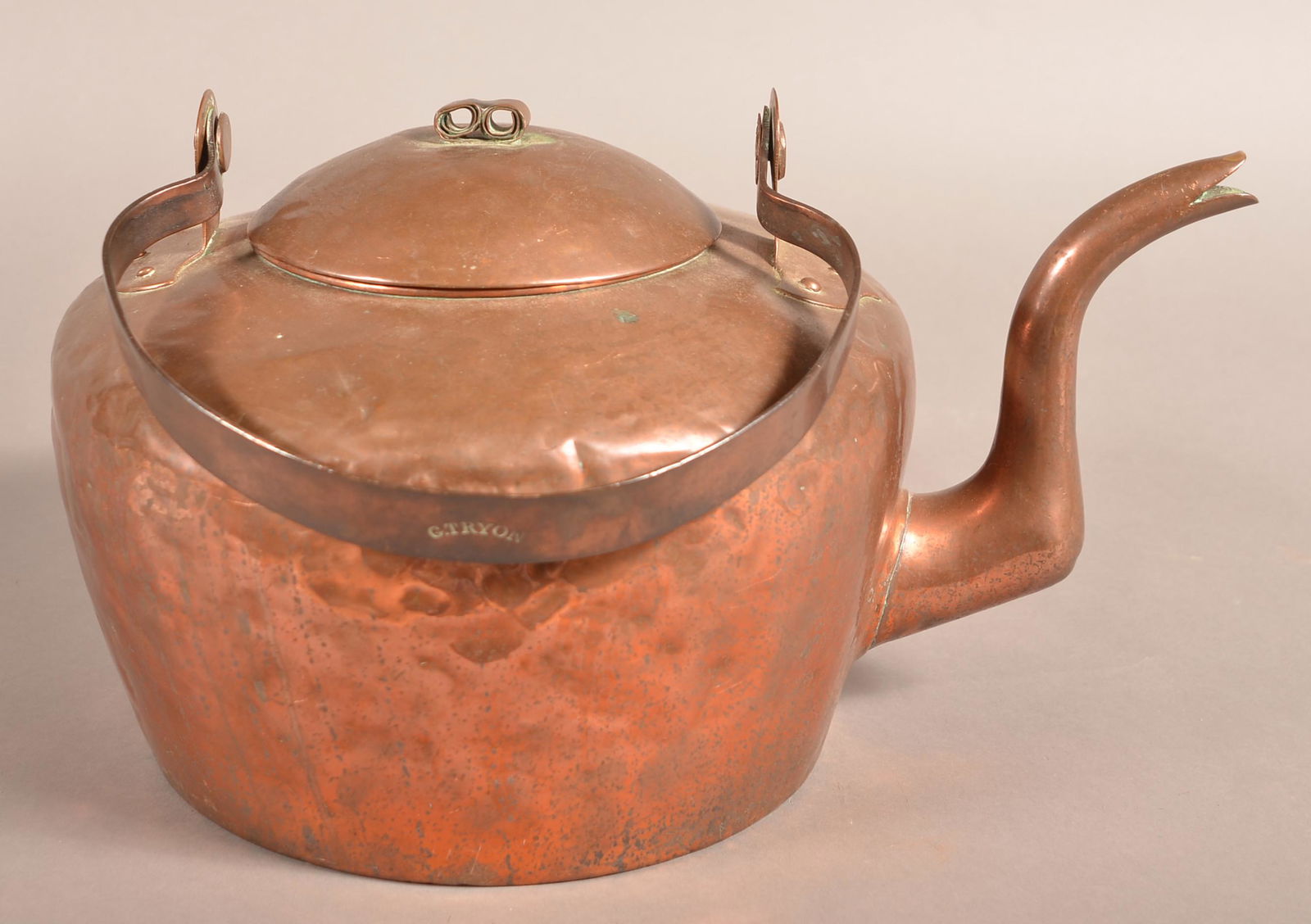 G. Tryon, Philadelphia, PA Copper Tea Kettle.: G. Tryon, Philadelphia Copper Tea Kettle. Early 19th Century. Arched swing handle mounted on tapered plinth base tabs, slightly domed lid with rams horn scrolled knob, goose neck spout and cramped sea
