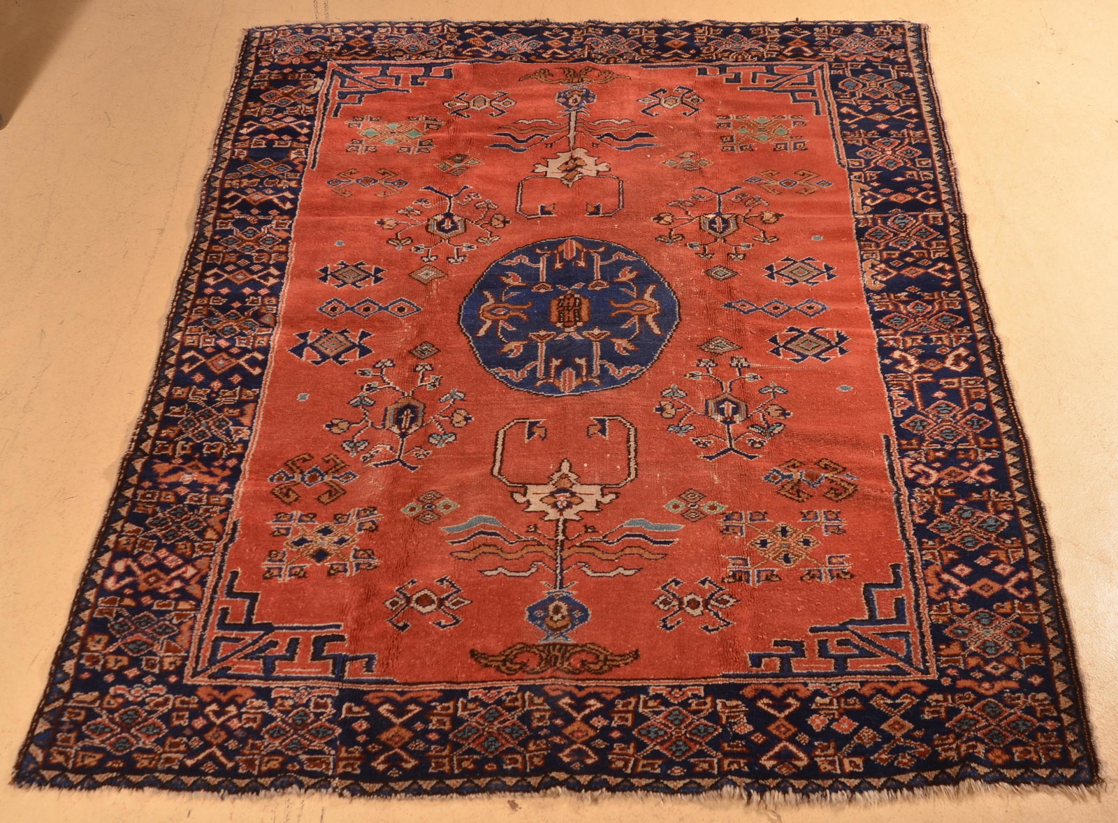 Antique Center Medallion Pattern Oriental Area Rug.: Antique Center Medallion Pattern Oriental Area Rug. 39" x 47". Condition: Good with wear.