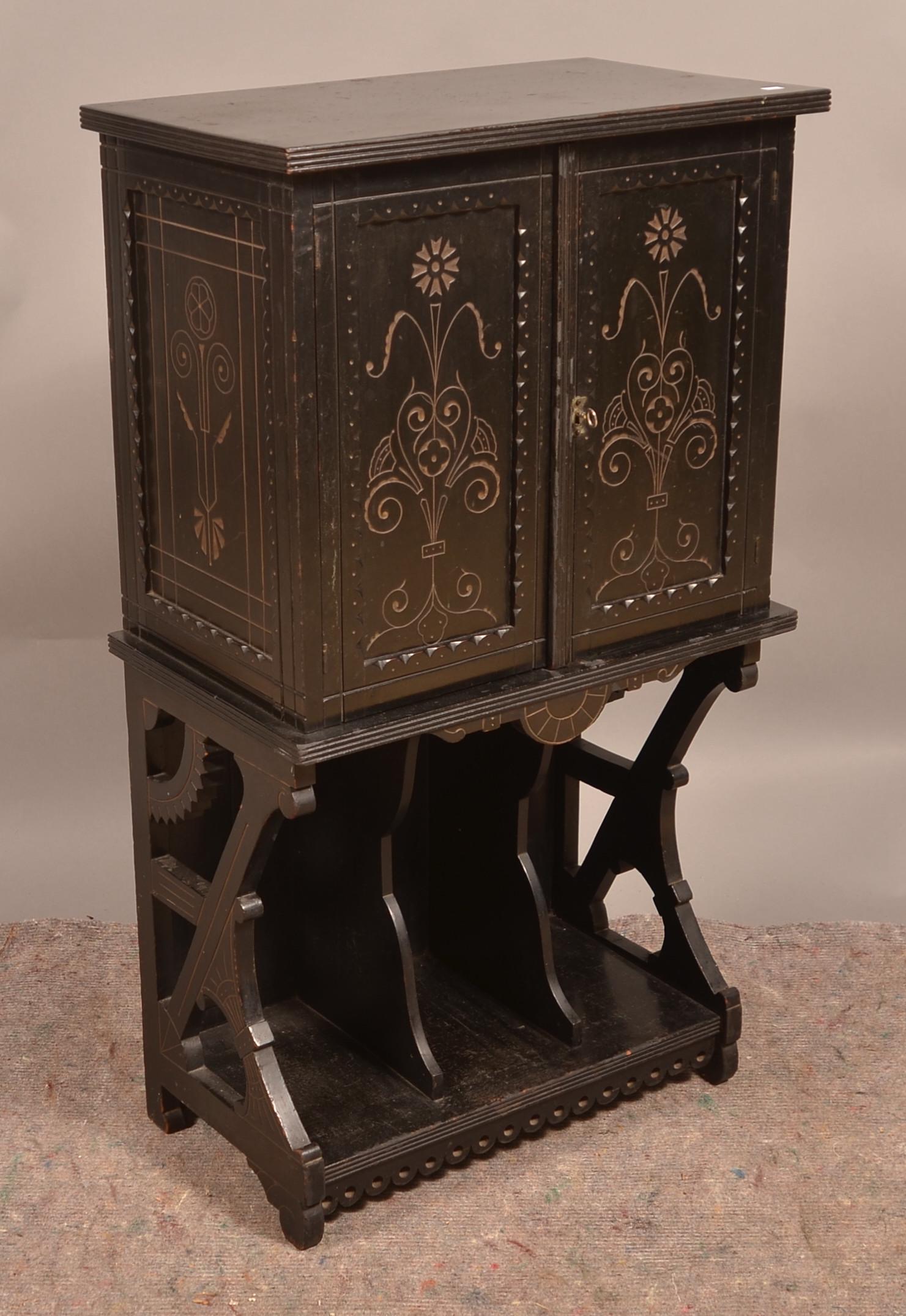 American Eastlake Victorian Music Cabinet.: American Eastlake Victorian Carved and Molded Music Cabinet. 41-1/2"h. x 23-1/4"w. x 14"d. Condition: Very Good.