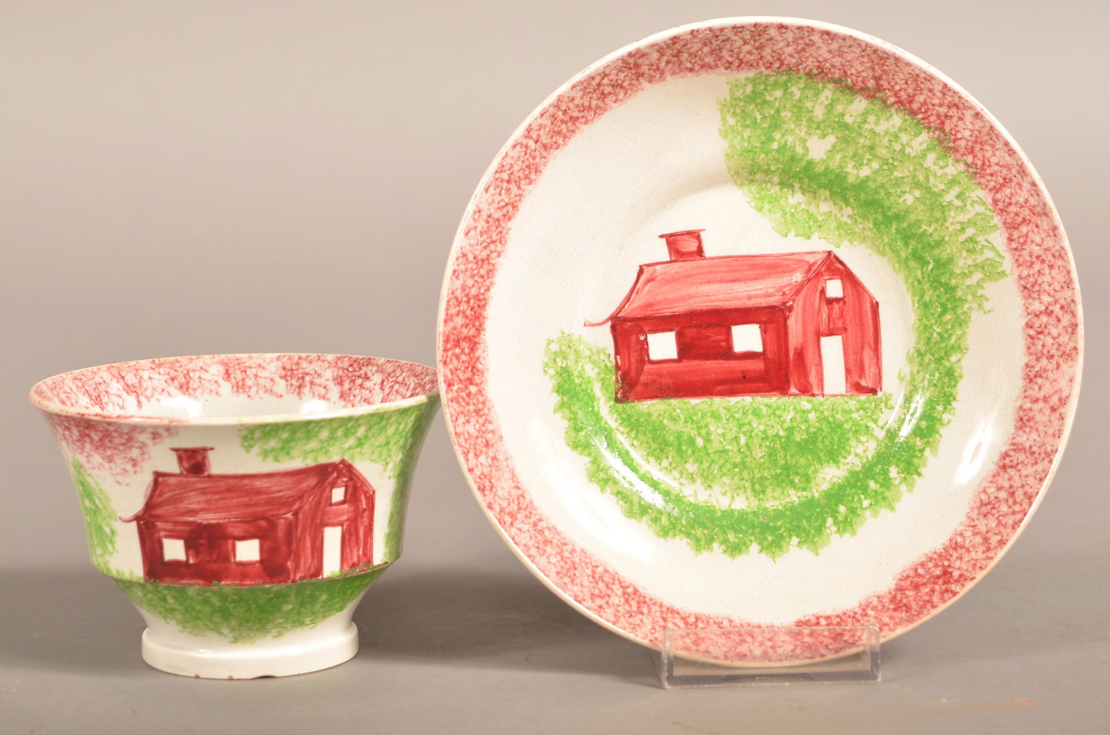 Red Spatter China School House Pattern Cup and Saucer. (1 of 3)