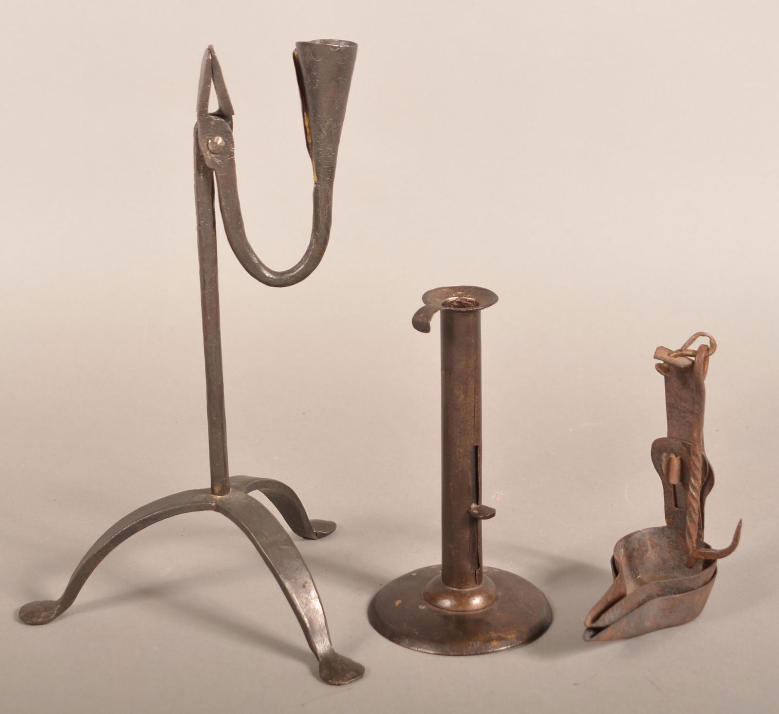Three Antique Wrought Iron Lighting Devices. (1 of 2)