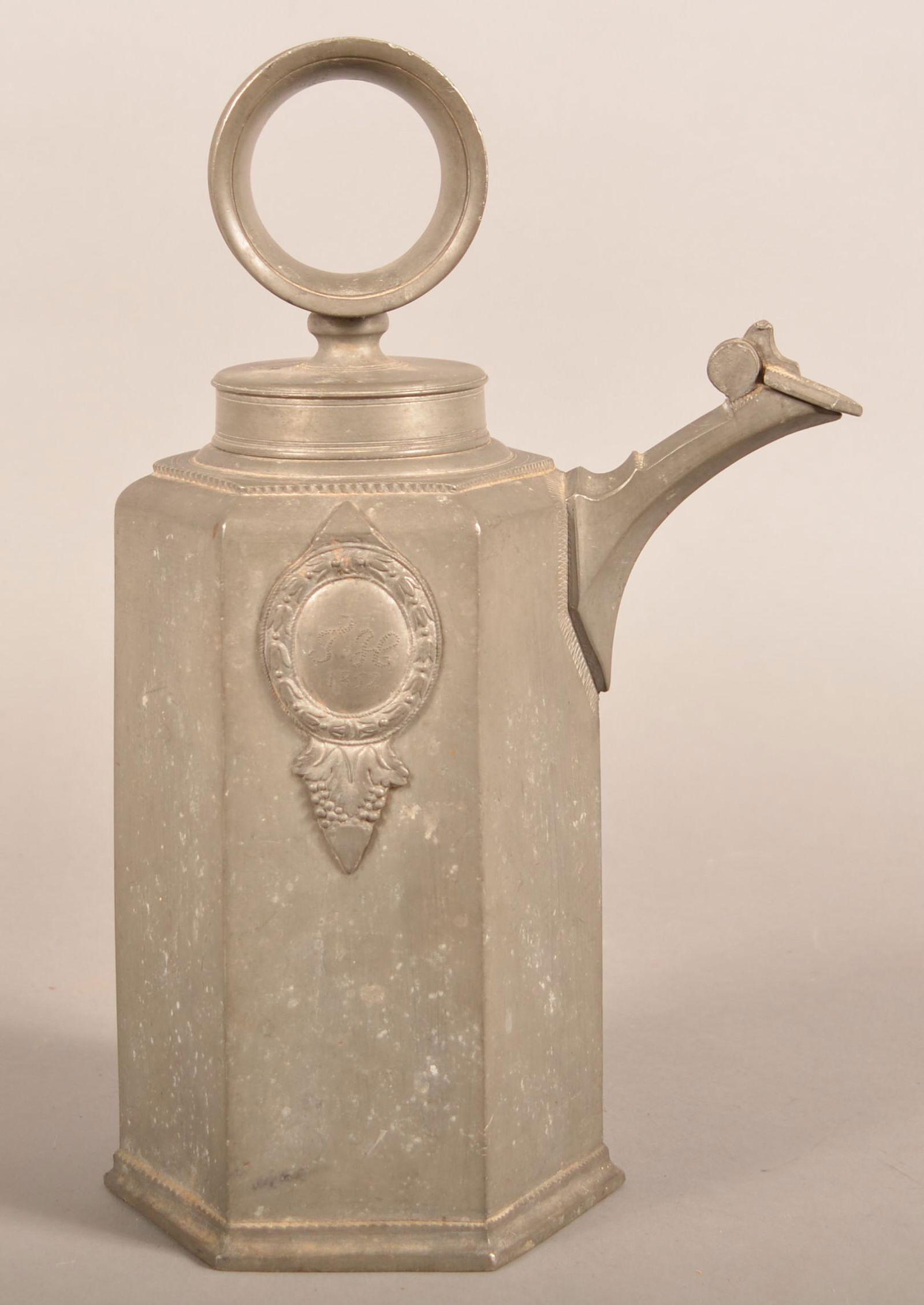 Swiss 1820 Pewter "Stegkanne" or Wine Flagon.: Swiss 1820 Pewter "Stegkanne" or Wine Flagon. Signed inside bottom "Ioh Jacob Ulrich Baur Zinngieser In Ghur 1820". Also hallmarked on spout cap and engraved on side medallion "J.H. 1852" a later owne