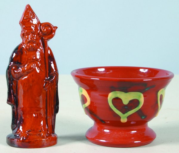 Two Redware Pieces, 1st is Ray E. Lear Religious Fi: Two Redware Pieces, 1st is Ray E. Lear Religious Figure 5-3/4"h., (good condition), 2nd is White 2000 small footed bowl with heart slip decoration, 2-7/8"h.x 4-1/4"dia., (good condition).
