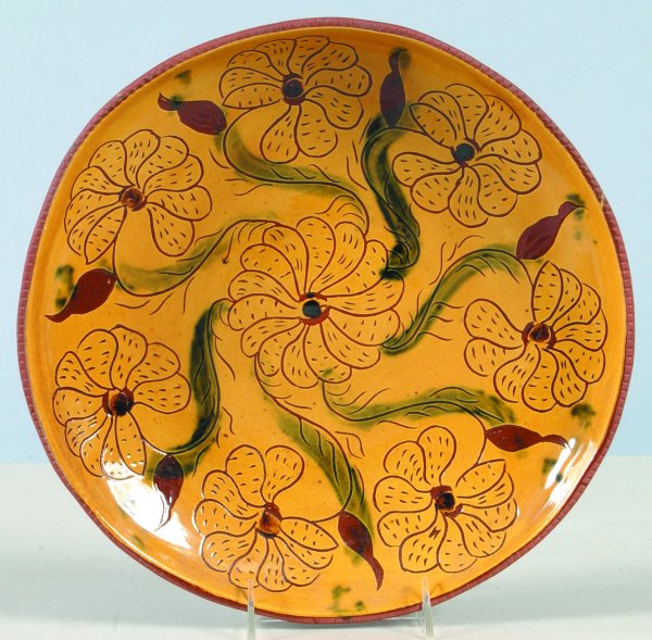 L. B. Breininger 1972 Sgraffito Decorated Plate wi: L. B. Breininger 1972 Sgraffito Decorated Plate with floral and foliate decorations, coggle rim, 12-7/8"dia., (very good condition).