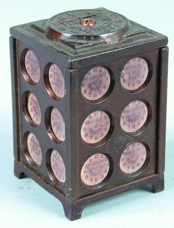 Cast Iron Time Zone Still Bank, bank has replaced : Cast Iron Time Zone Still Bank, bank has replaced paper labels, overall good condition with paint loss and wear, 4-1/4" h.