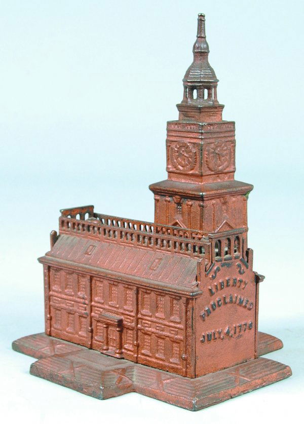 Independence Hall Cast Iron Still Bank manufacture: Independence Hall Cast Iron Still Bank manufactured by Enterprise Mfg. Co., Phila. Pa., bank has overall great casting with no signs of loss, paint loss and wear throughout building, 9" h.