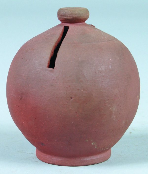 Redware pottery bulbous form still bank, banks is: Redware pottery bulbous form still bank, banks is in overall great condition only showing discoloration to finish, bank stands 3-3/4" high