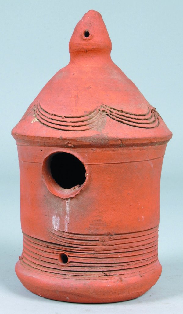 Unglazed Redware Bird House with conical shape roo: Unglazed Redware Bird House with conical shape roof with finial, incised swag and line decorations, 10-1/2"h., (good condition).