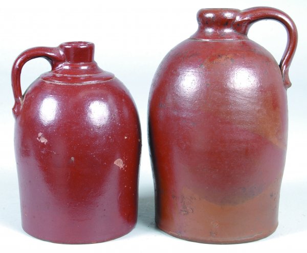 Two Redware Jugs with brown glaze, applied handles