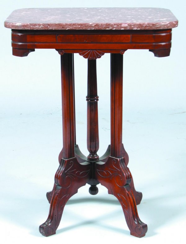 Eastlake Victorian Walnut Marble-top Parlor Stand.: Eastlake Victorian Walnut Marble-top Parlor Stand. Rectangular brown marble top with carved and molded walnut base. Condition: Very good. (Hershey Museum). 29"h x 22 ½"w x 16"d.