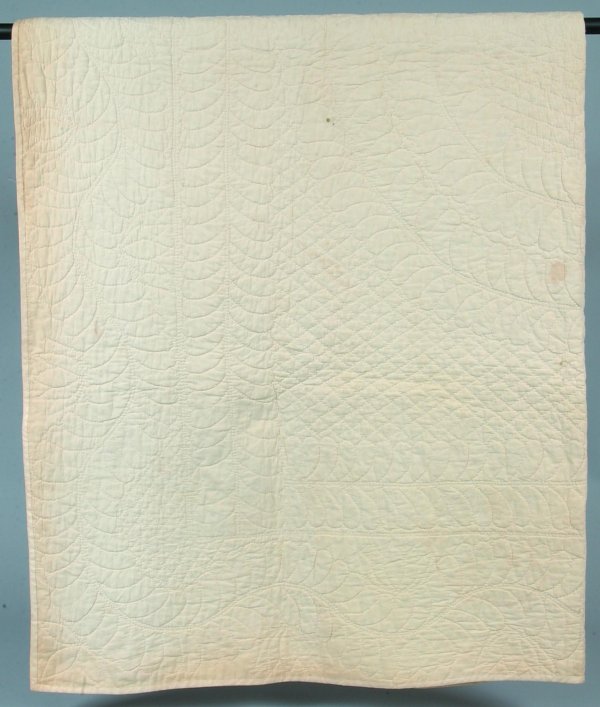 White Plume Quilted Quilt having center plume and : White Plume Quilted Quilt having center plume and diamonds designs, serpentine plume border, 68" x 74", (Hershey Museum), (stains and discoloration).