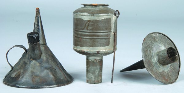 Three Tin Lighting Devices; Witch's cap Oil Lamp, W: Three Tin Lighting Devices; Witch's cap Oil Lamp, Whale Oil Peg Lamp and Candle Holder, 4"h. Good.
