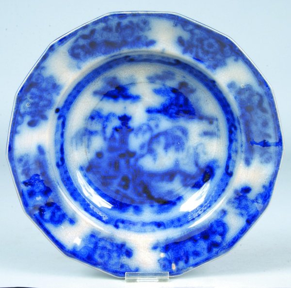 Flow Blue China Pelew pattern 9 ½" Soup Plate by E: Flow Blue China Pelew pattern 9 ½" Soup Plate by E. Challinor. Good with crazing and discoloration.