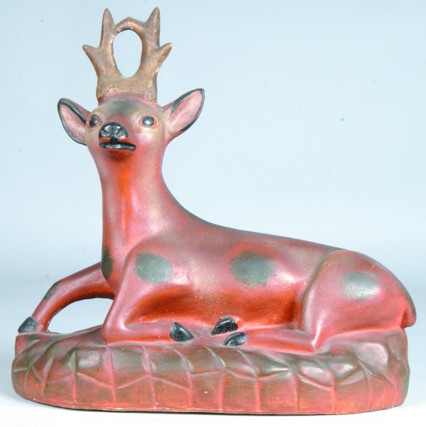 Late19th/Early 20th Century Plaster of Paris Recli: Late19th/Early 20th Century Plaster of Paris Reclining Stag with original paint. 16"h x 16"w x 6 ½"d. Condition: Good.