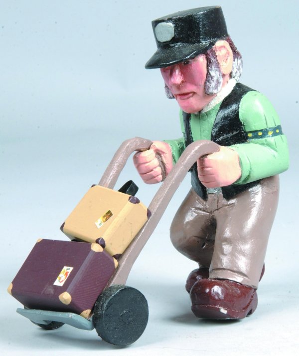 Edward Graham Railroad Baggage Handler Carving sig: Edward Graham Railroad Baggage Handler Carving signed EG86, carved and polychrome painted, 6-1/2"h., (good condition).