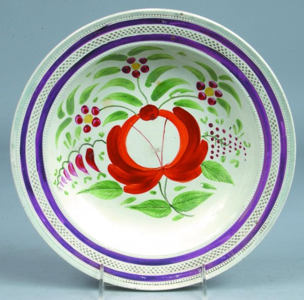 King's Rose Enamel and Lustre Decorated 10 ¼" Soup: King's Rose Enamel and Lustre Decorated 10 ¼" Soup Plate. Large central rose with Floral, bud, sprig and foliate design with pink lustre banded border. Pin-nip on edge and minor losses to leaves.