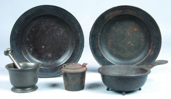 Five Cast Iron Pieces; two 9-3/8"dia. Plates, Mort: Five Cast Iron Pieces; two 9-3/8"dia. "Prison" Plates,(from Monroe Co. Jail) Mortar and Pestle, 2-3/4"h. small hinged top glue pot marked "The Home "on lid and Wapak swastika mark on base, 3"h. Posnet