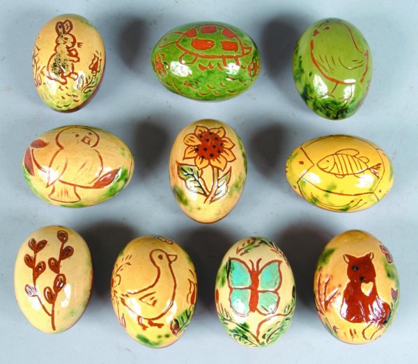 Ten Breininger Redware Sgraffitto Decorated Eggs, i: Ten Breininger Redware Sgraffitto Decorated Eggs, including animals and floral decorated, various years, average size 2 ½"h. (very good condition).