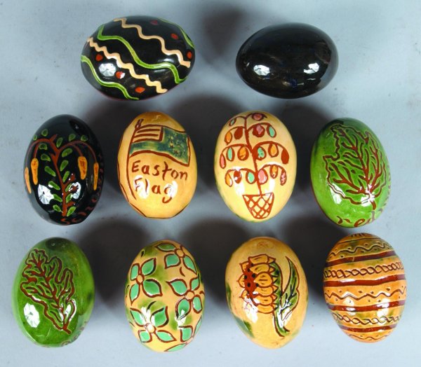 Ten Breininger Redware Sgraffito Decorated Eggs inc: Ten Breininger Redware Sgraffito Decorated Eggs including floral and leaves and etc. average size 2 ½"h. (very good condition).