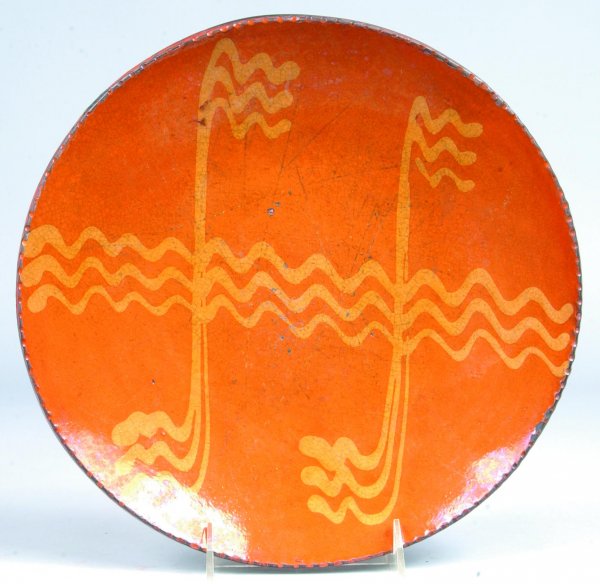 Greg Shooner 2003 Redware Slip Decorated Plate havi: Greg Shooner 2003 Redware Slip Decorated Plate having triple wavy line and flag style slip decorations, 11"dia. (good condition).