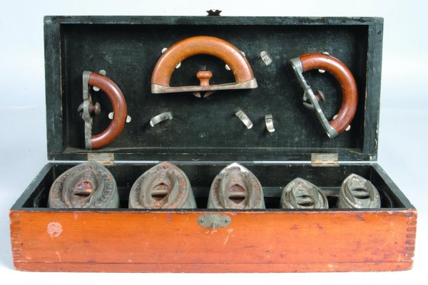 Enterprise Sad Iron Boxed Set, assembled set of fi: Enterprise Sad Iron Boxed Set, assembled set of five sad irons with three removable handles, in finger jointed hinged top box, three number 50 and two smaller ones, interior of box is fitted , 4 ¾"h.