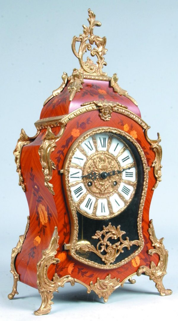 Reproduction Clock and Matching Wall Shelf, having: Reproduction Clock and Matching Wall Shelf, having imitation floral and foliate inlaiy and mahogany finish, brass ornate ormolu mountings, roman numerals, works marked FHS Germany, clock 22 ½"h., wal
