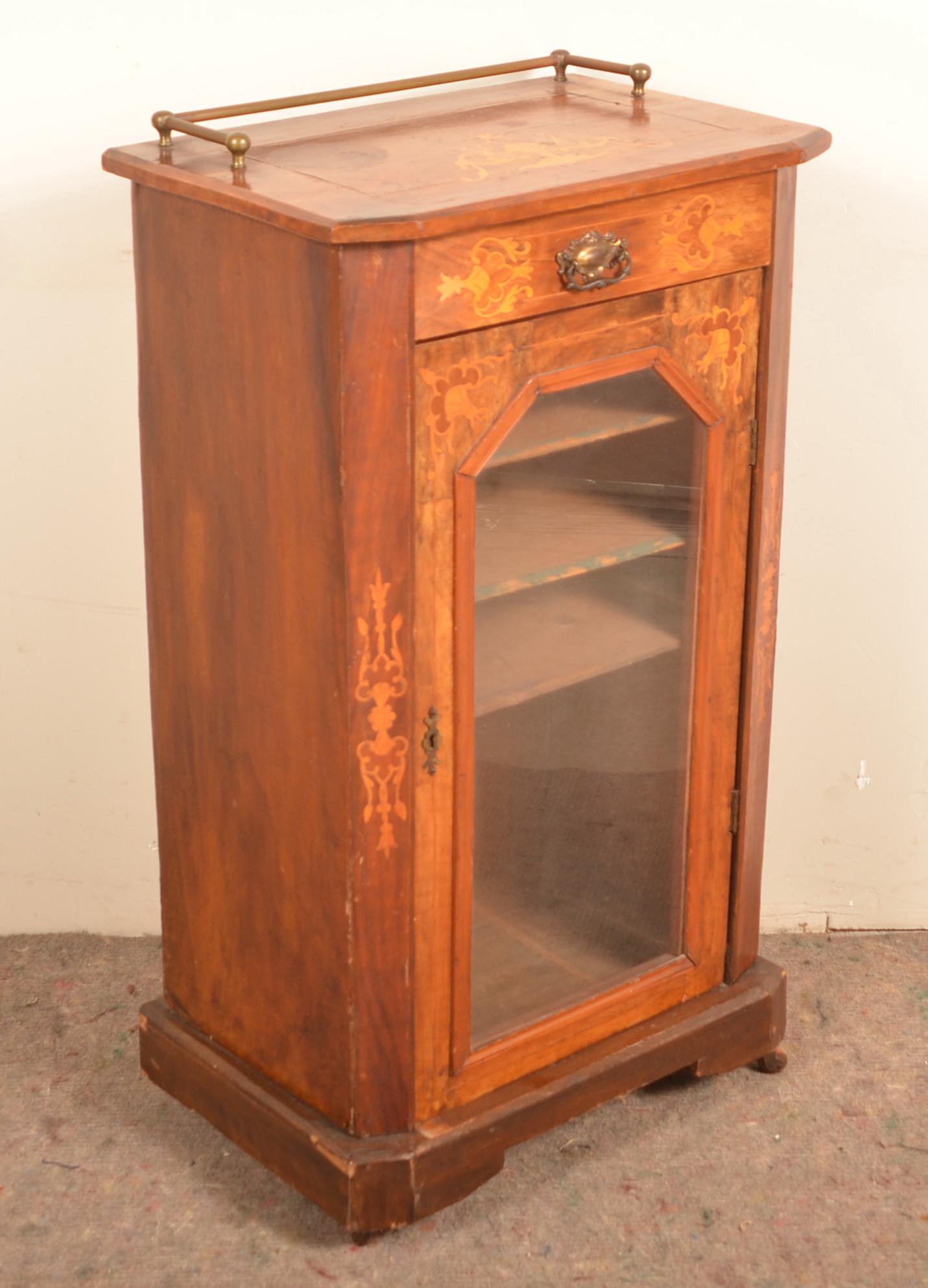 19th Century Marquetry Music Cabinet: 19th Century Marquetry Music Cabinet. Applied brass gallery, glazed door and bracket base. 36"Hx20-1/2"Wx13-1/2"D. Condition: Good, with sun fading and wear.