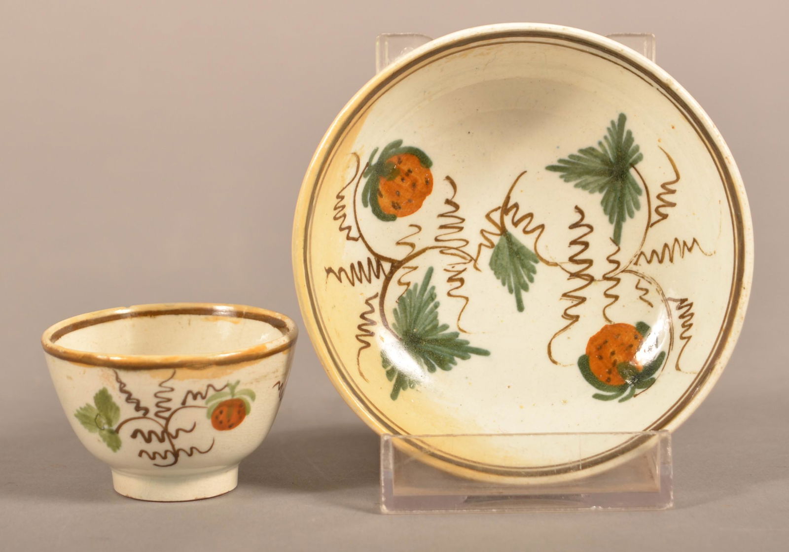 Leeds Soft Paste China Strawberry Cup and Saucer. (1 of 3)