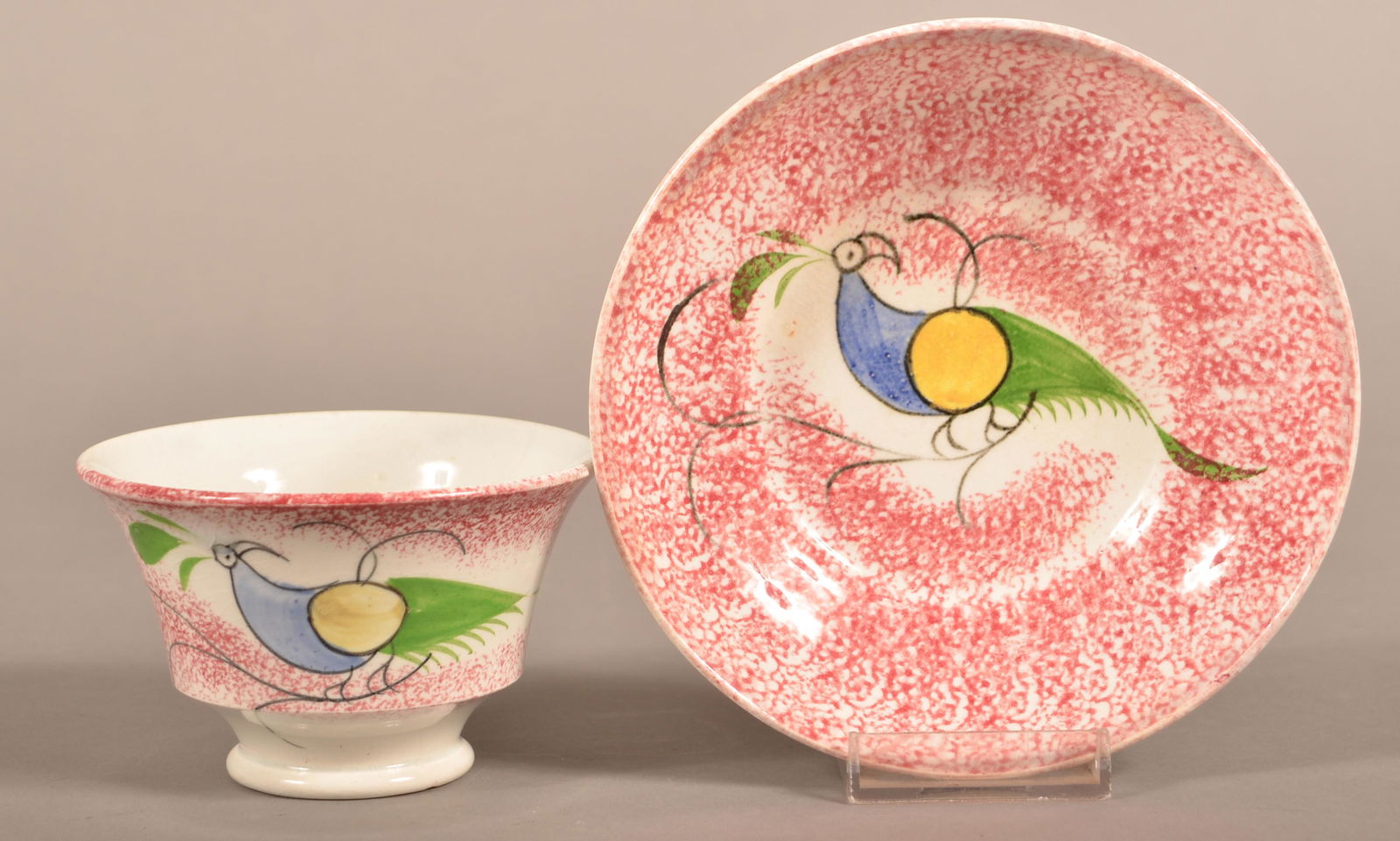 Red Spatter China Peafowl Pattern Cup and Saucer. (1 of 3)