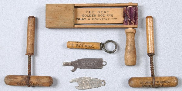 Advertising Lot: (3) Rohrer's Cork Screws, (2) met: Advertising Lot: (3) Rohrer's Cork Screws, (2) metal Bottle Openers, "J.J.Swhwendt Distributor, Lancaster, Pa." and "Star Beer, Lancaster, Pa." and Chas. A. Grove Wooden Clacker Noise Maker. Condition