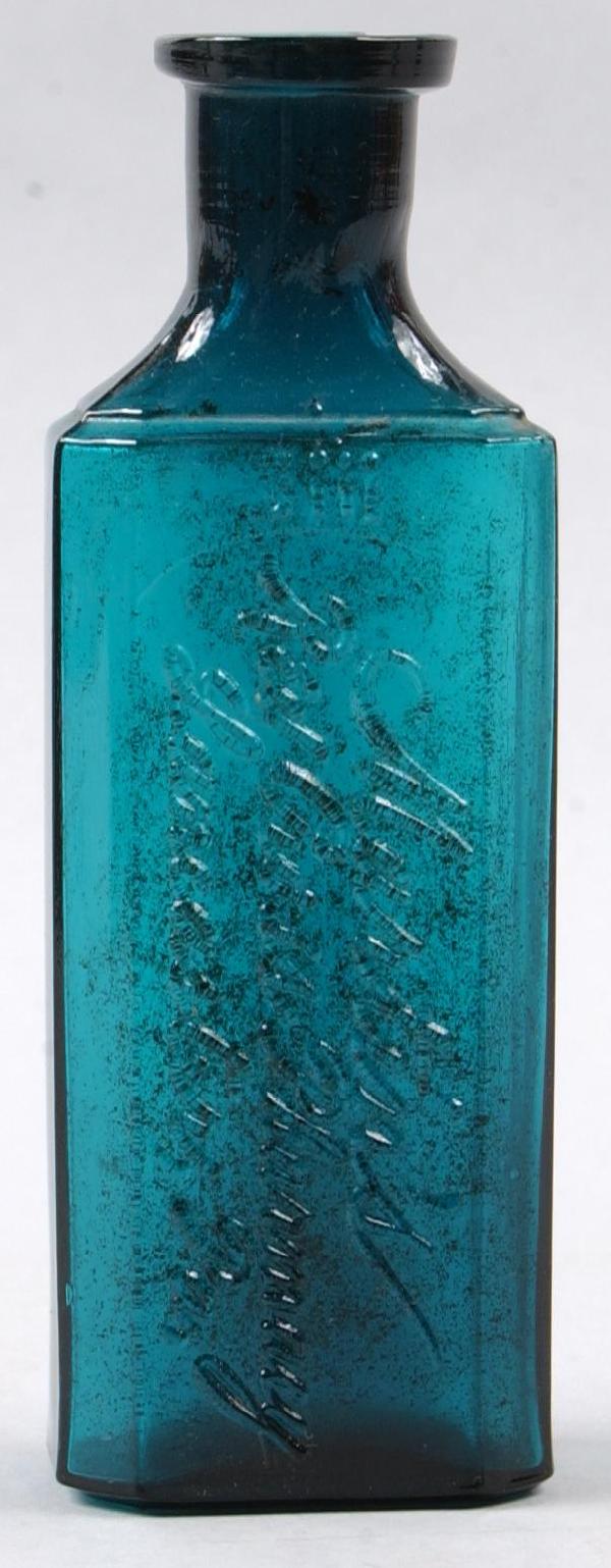 Martin's Red Rose Pharmacy Lancaster, Pa. amethyst: Martin's Red Rose Pharmacy Lancaster, Pa. amethyst medicine bottle,5.25", Condition: top rim chip.