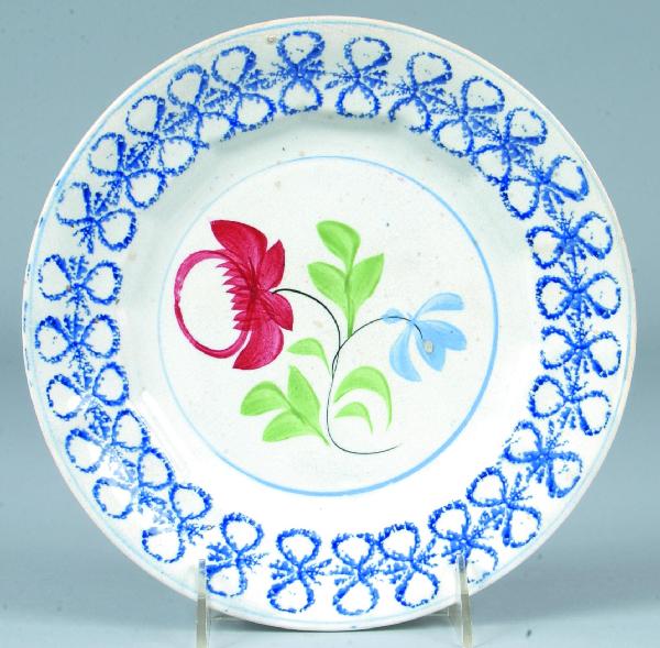 Design Spatter Adams Rose with Blue Four-Petal Flo: Design Spatter Adams Rose with Blue Four-Petal Flower 8 ¾" Ironstone China Plate having blue bowknot border. Condition: Good.
